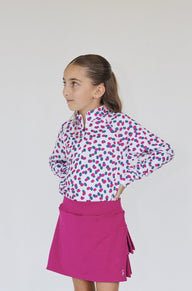 playera y falda rosa para golf - Moda deportiva para niña
