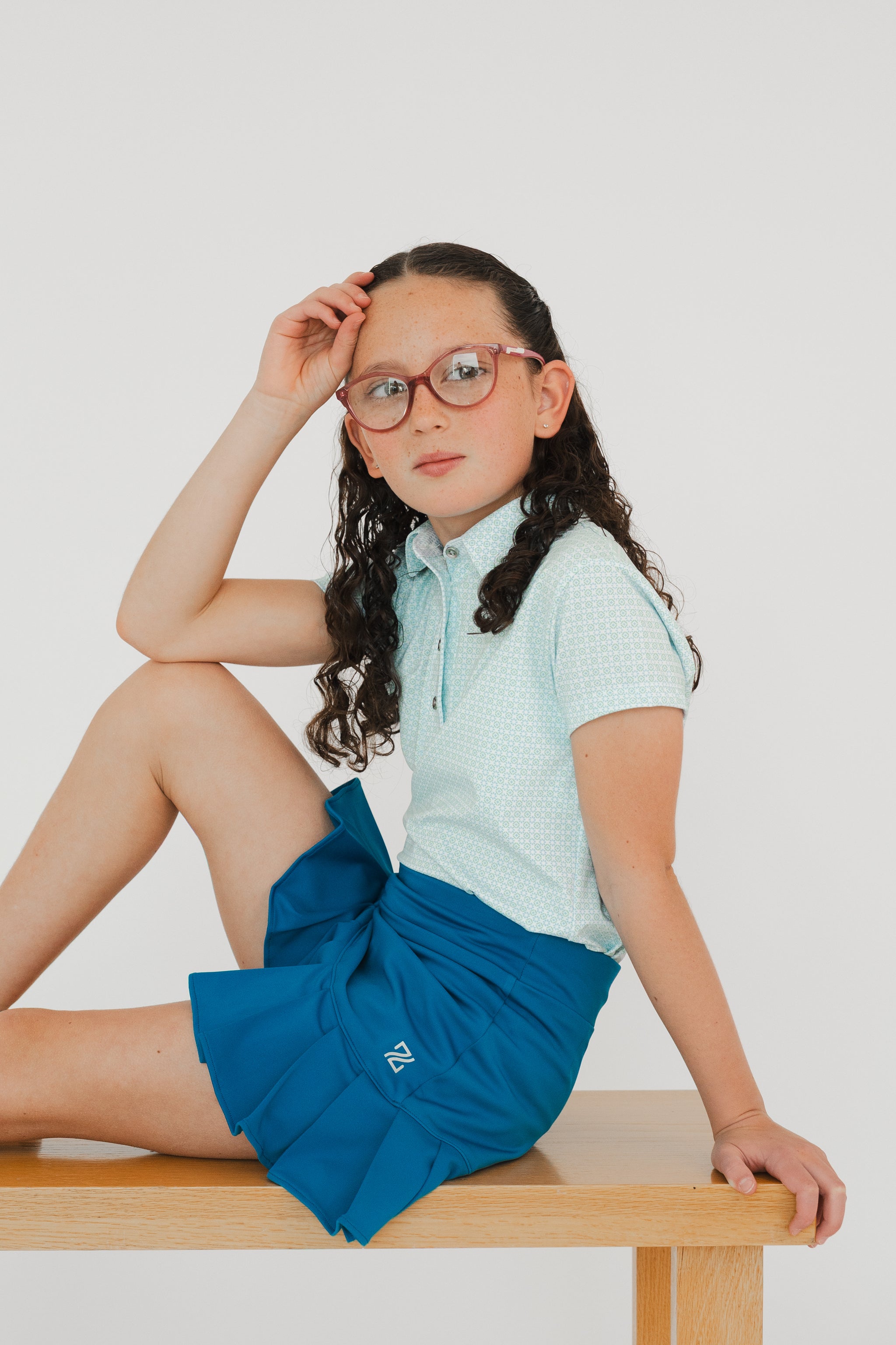 Falda tableada azul para niña Zendra para golf y pádel en lycra Dry