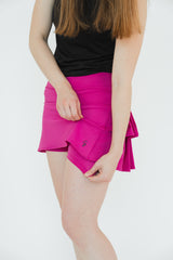 Falda deportiva golf rosa fucsia - Tablones clásicos edición limitada Gaby López Open 2025