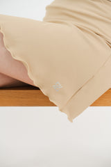 Falda diagonal golf caqui mujer - Corte moderno favorecedor lycra dry secado rápido