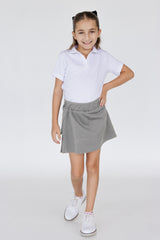 Falda gris con tablones y lycra dryfit para niña, ideal para pádel o golf