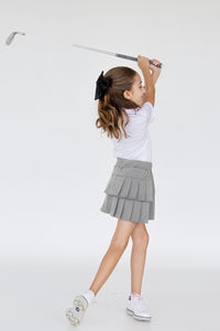 Falda deportiva de golf para niña gris con tablones, bolsa lateral y lycra