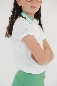 Polo blanca golf para niña con cuello estampado y tecnología DryFit