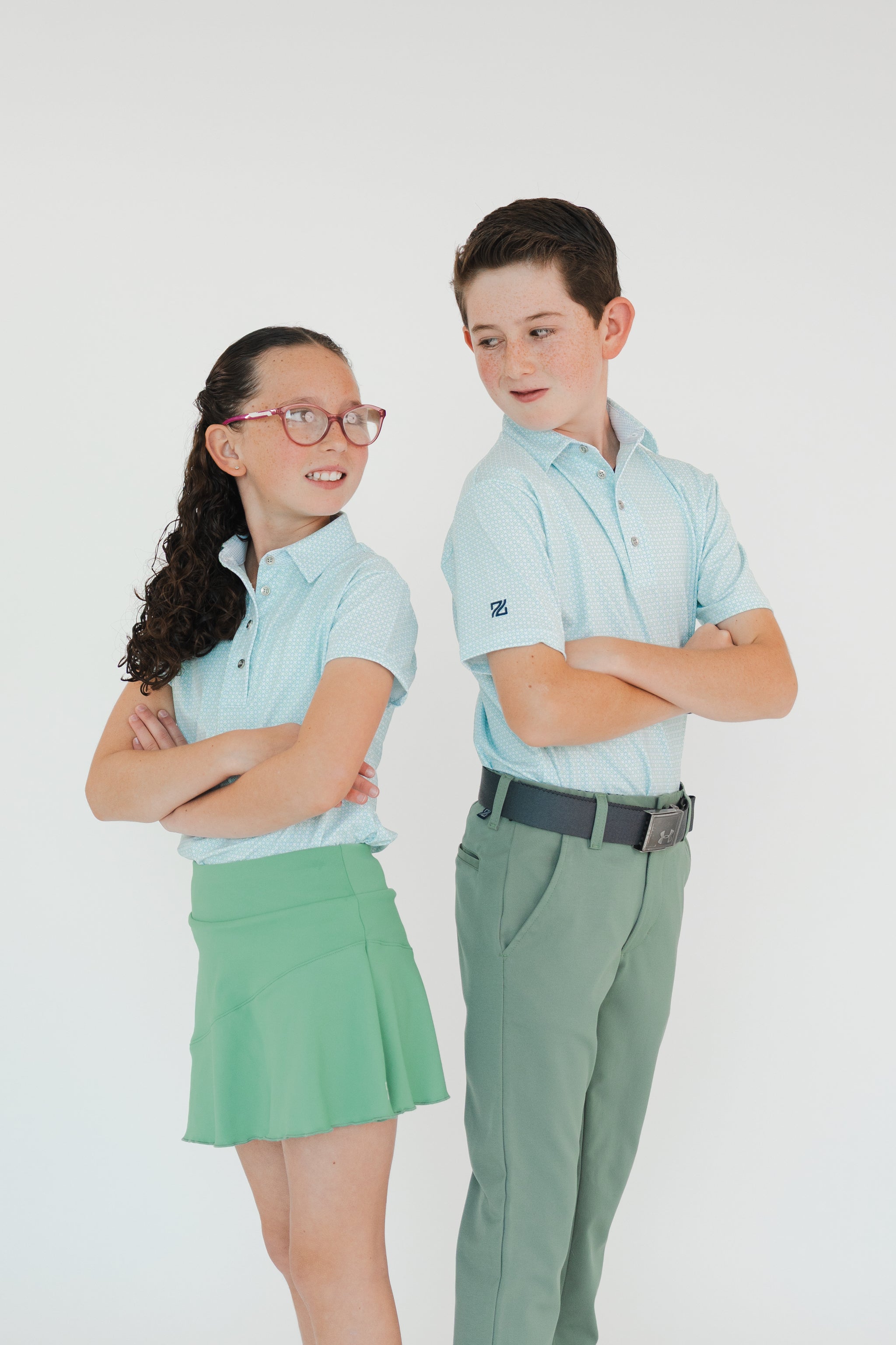 Polo estampada de golf para niño y niña con tela DryFit