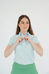 Polo golf mujer azul estampada DryFit protección solar - Diseño elegante secado rápido Zendra