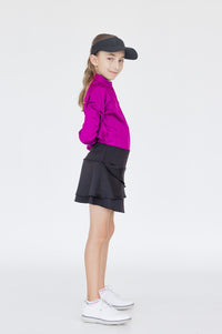 Detalle bolsillo trasero falda negra niña Zendra para golf