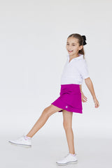 Falda de golf niña Zendra buganvilla corte tulipán con bolsillo trasero