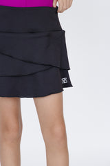 Falda negra para niña Zendra corte tulipán con bolsillo trasero