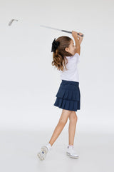 Falda plisada azul para niña con short interior dryfit y bolsa – Zendra