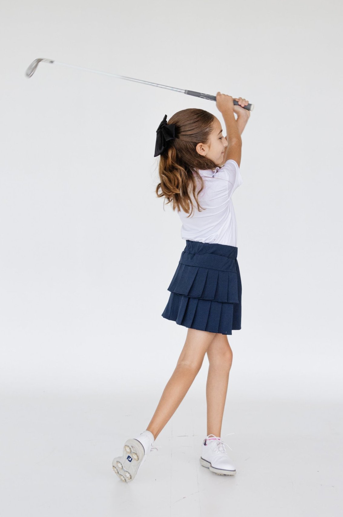 Falda plisada azul para niña con short interior dryfit y bolsa – Zendra