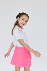 Falda de golf para niña con corte tulipán, lycra dryfit y bolsa trasera, color rosa