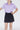 Falda de golf para niña en colores lisos con short interior lycra dryfit
