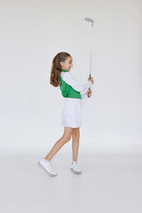 Falda plisada blanca para niña con lycra interior dryfit y bolsa