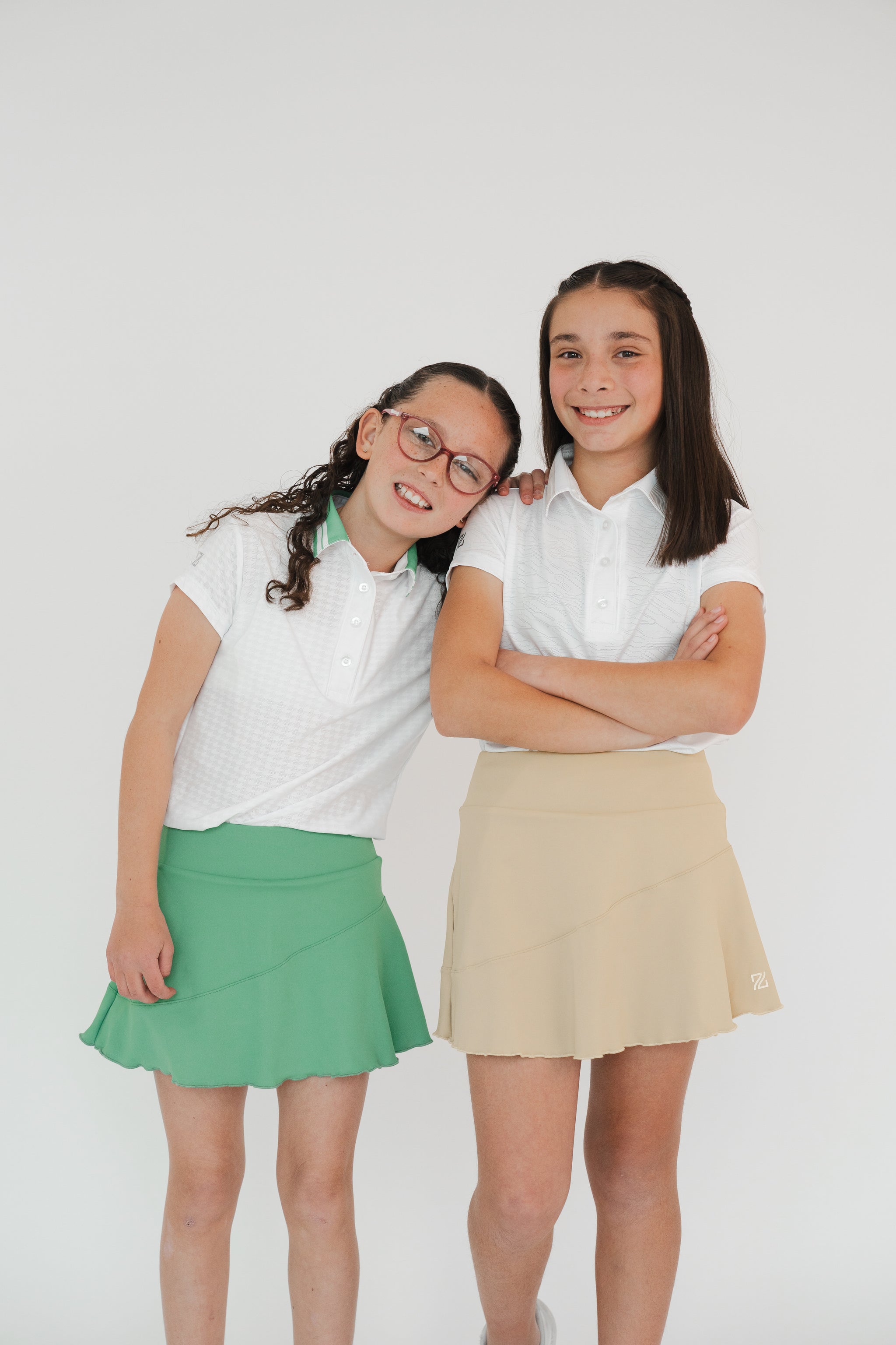 faldas de golf stretch para niñas con bolsa color verde y caqui