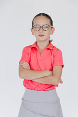 Polo coral para niña Zendra corte golf técnico lycra Dry