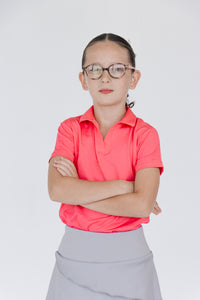 Polo coral para niña Zendra corte golf técnico lycra Dry