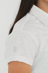 polo golf niña dry tela transpirable blanca